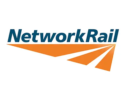 Two logos on a white background separated by a thin vertical line: “McLaren Applied” in black on the left and “Network Rail” in blue with orange diagonal stripes on the right. Below the logos, the text reads “Driving increased data offload with 5G technology.”